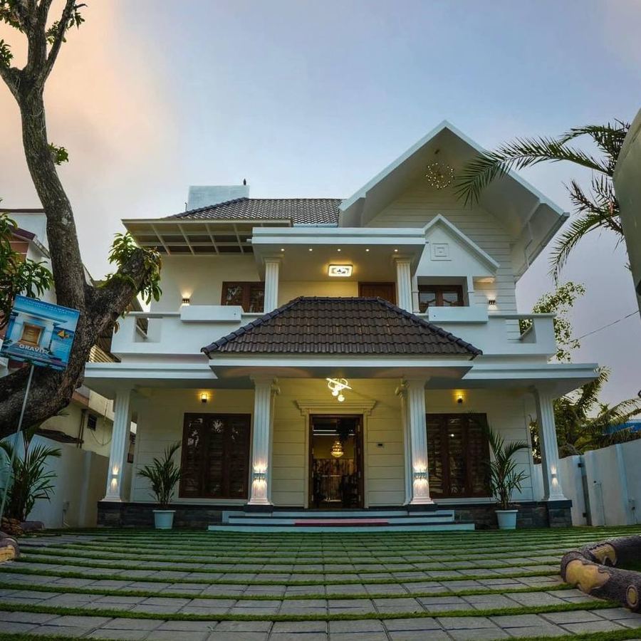 Abdul Basith Residence, a traditional style two-storey house with tiled roof and colonnaded porch