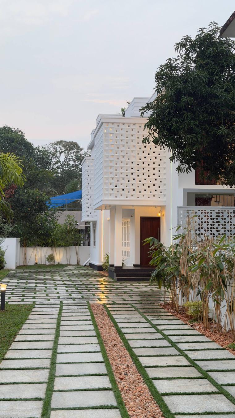 Sanju Residence with perforated jali screen facade